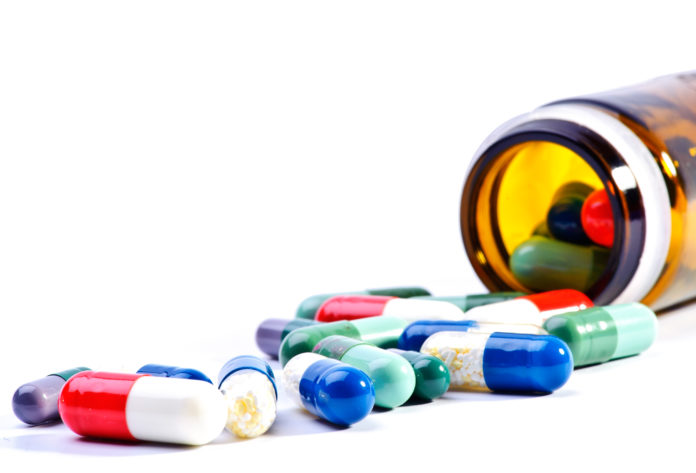 Pill-bottle-spilling pharmacy